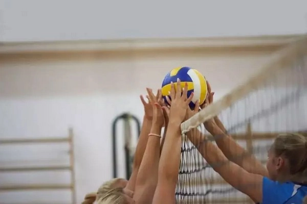 Why are net-touching errors so costly in pressure volleyball?