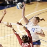 Why are net-touching errors so costly in pressure volleyball?