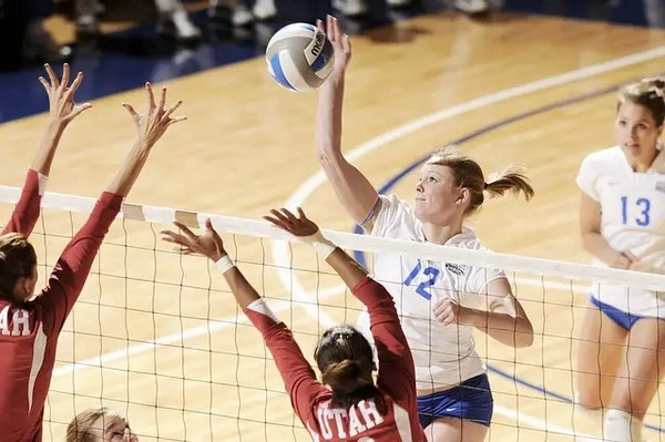Why are net-touching errors so costly in pressure volleyball?